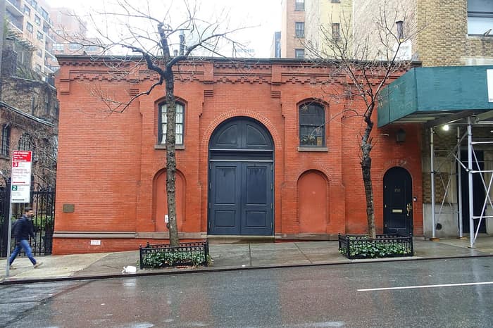 Number 1 Sniffen Court, one of the two-story brick former stables