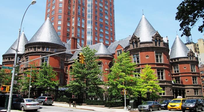 The former New York Cancer Hospital at 455 Central Park West with its round towers