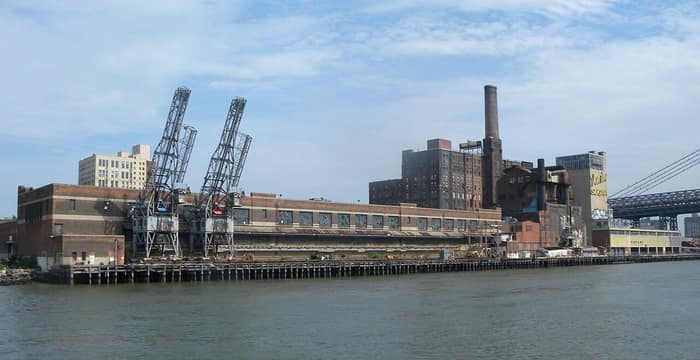 The Domino Sugar Refinery seen from the north with the Williamsburg Bridge nearby