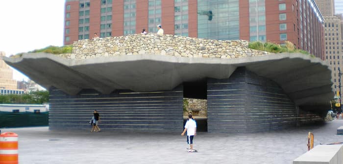 The grassy slope and stone walls of the Irish Hunger Memorial in Battery Park City